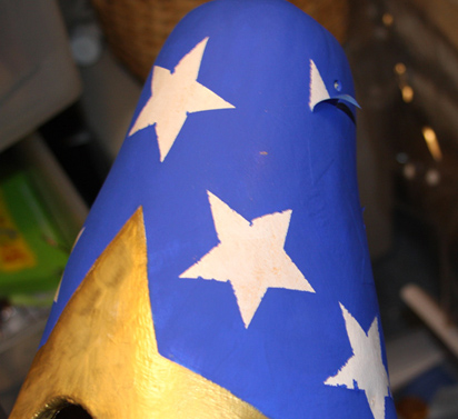 Remove stickers from blue background of Flag birdhouse