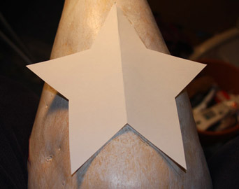 Trace star template over birdhouse gourd entrance