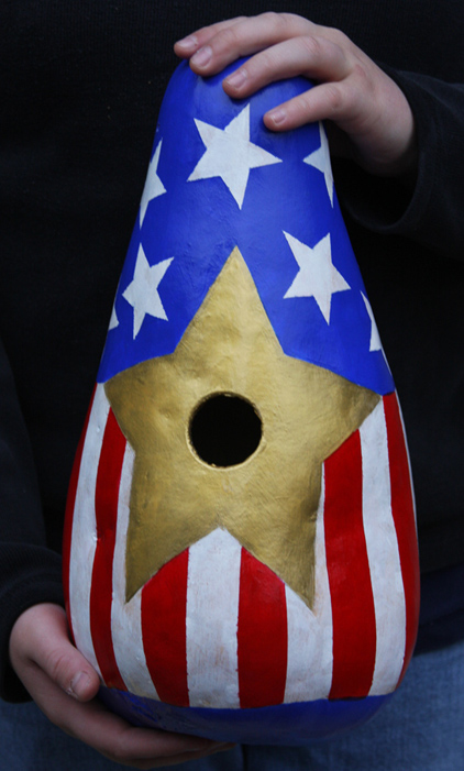 Birdhouse gourd centerpiece for Fourth of July